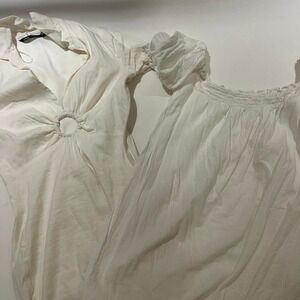 Two white mini dresses